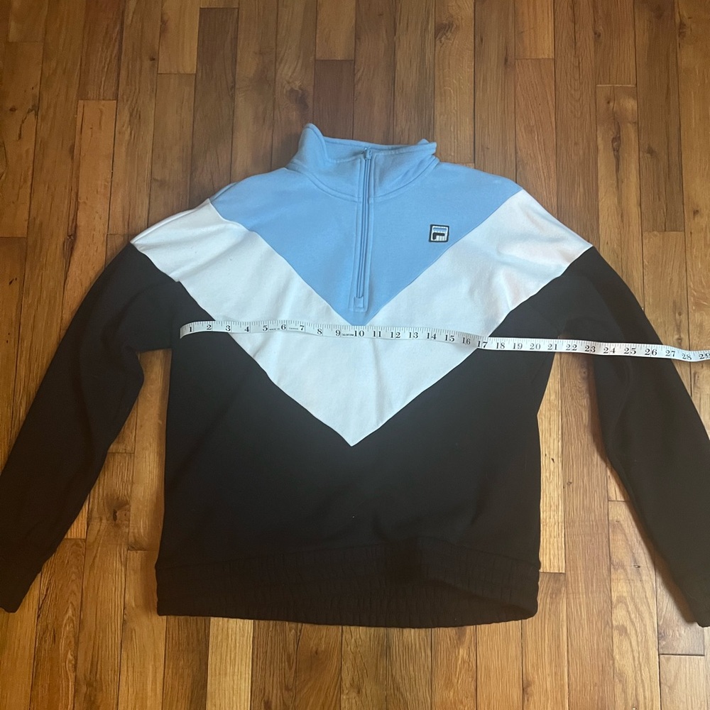 Woman’s Fila Blue, Black, And White Pull Over quarter Zip Crew Neck Size Large